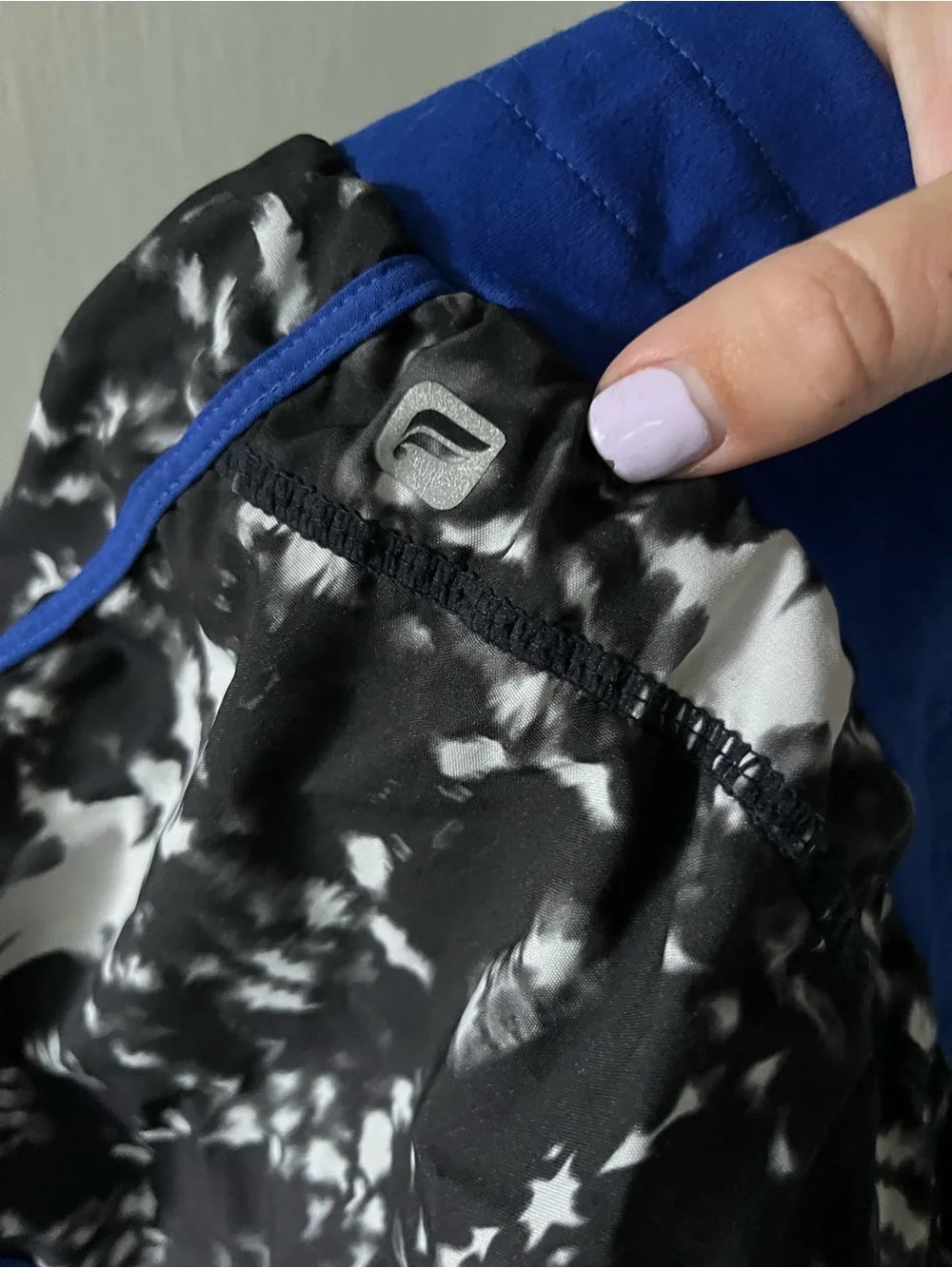 Fabletics - Black & White Marble Print Athletic Shorts with Royal Blue Trim - Picture 3 of 5